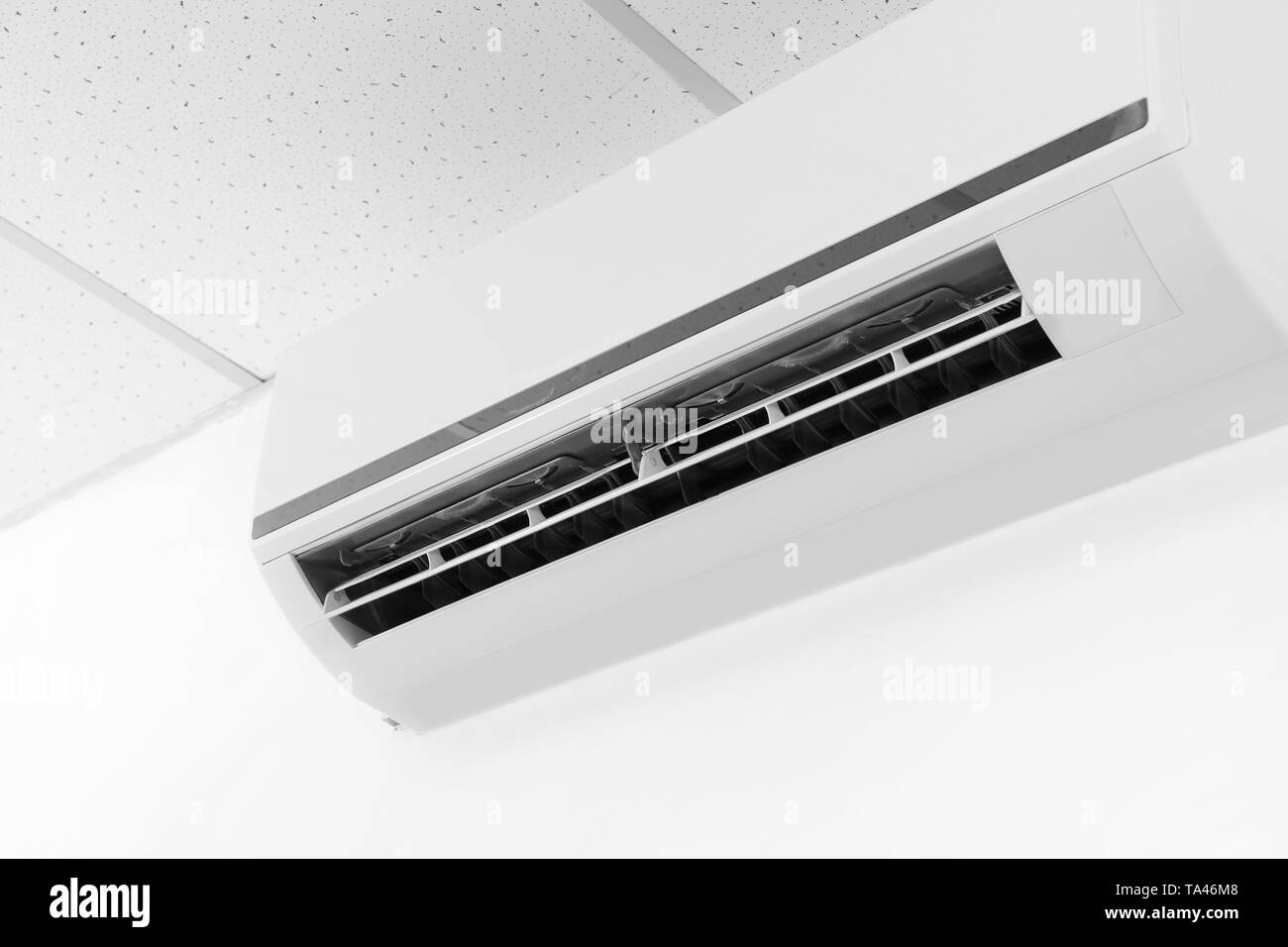 Wall mounted air conditioner Black and White Stock Photos & Images - Alamy