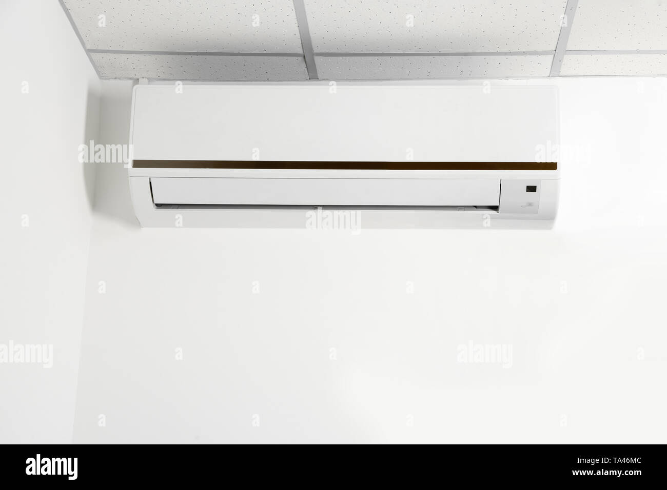 Modern air conditioner on wall Stock Photo - Alamy