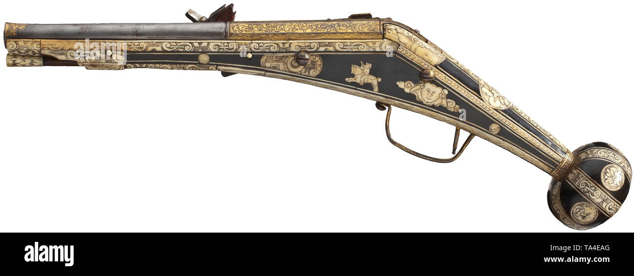 A bone-inlaid, gilt wheellock puffer, Augsburg, circa 1580/90 Two-stage barrel, octagonal breech section, then round after cut girdles, with smooth bore in 13 mm calibre. Over the muzzle and chamber florally engraved, gilt decoration. The top of the barrel with two struck Augsburg marks, Pyr and flower within a shield. Gilt and chiselled wheellock en suite engraved with flowers, with domed wheel cover and spring-loaded safety lever. Ebonised fruitwood stock with engraved and blackened, profuse bone inlays. The pommel with stripe and disc inlays i, Additional-Rights-Clearance-Info-Not-Available Stock Photo