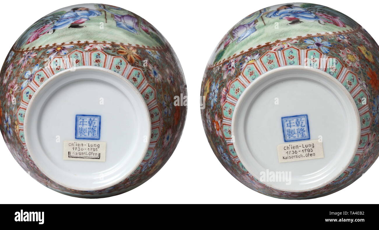 A pair of Chinese vases of eggshell porcelain, Qianlong marks, probably 19th century Bulbous vases with concave necks made of fine, translucent, white porcelain. Multi-coloured and partially gilt ornamentation in the style of 'famille rose' over the entire surface. On both sides, matching oval, mirror-image cartouches depicting genre scenes with several figures, surrounded by rich floral decorations. On each base, the blue mark of the Qianlong period (1736-95). Height of each vase 21.5 cm. historic, historical, China, Chinese, 19th century, Additional-Rights-Clearance-Info-Not-Available Stock Photo
