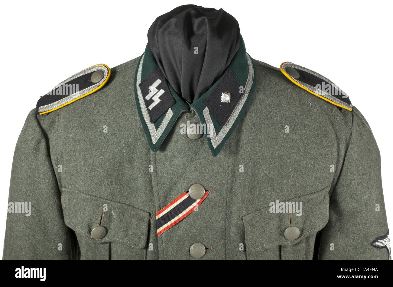 A field tunic M 36 of an Unterscharführer in an SS cavalry or reconnaissance unit depot piece, dated 1941 Field-grey woollen cloth with metal buttons, brown cotton lining with size and depot stamps of the Munich Army Clothing Office. Orders loops, War Merit Cross ribbon. The tunic is customised for the wearer and fitted with a pointed dark-green collar, enlarged to attach the silver braiding signifying the rank of Unterführer. Black collar patches with runes and metal rank stars respectively, all embroidered in silver. Black slip-on shoulder boards with golden-yellow branch, Editorial-Use-Only Stock Photo