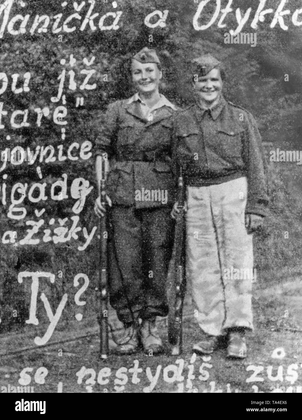 Advertising poster of the Czech partisans. On the poster, two armed women. The Czech resistance was established only in the last years of the war with the support of the USSR. Stock Photo