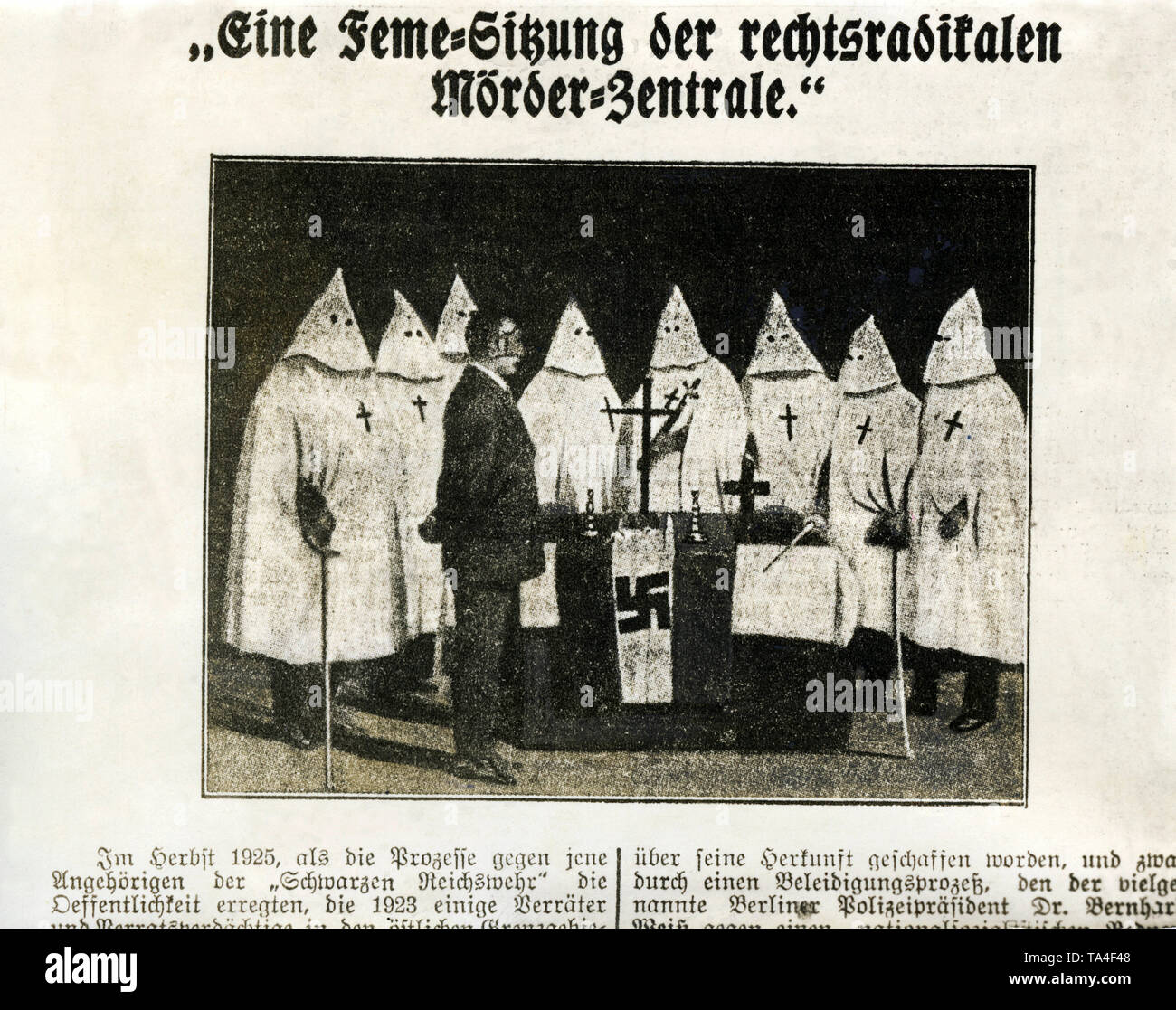 A right-radical group of Fememoerders (political murderers)  holding a meeting in front of an altar adorned with swastika flags. Stock Photo