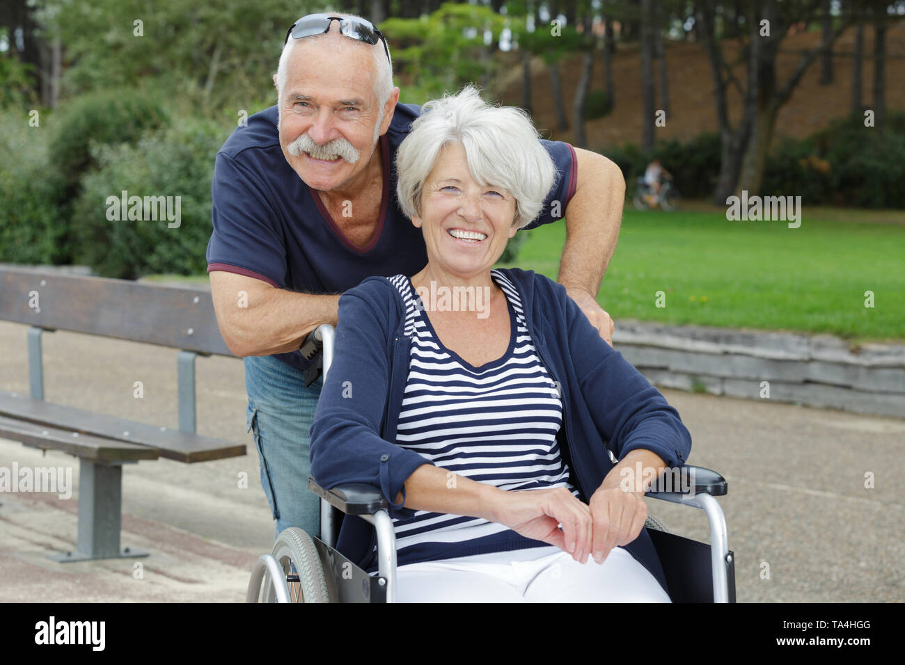 Wheelchair in tree scene hi-res stock photography and images - Alamy