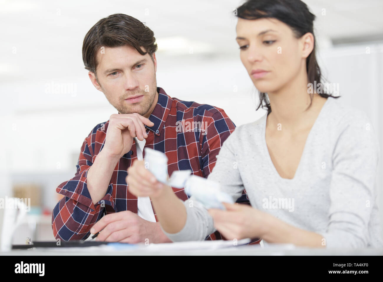 couple unpacking at new home Stock Photo