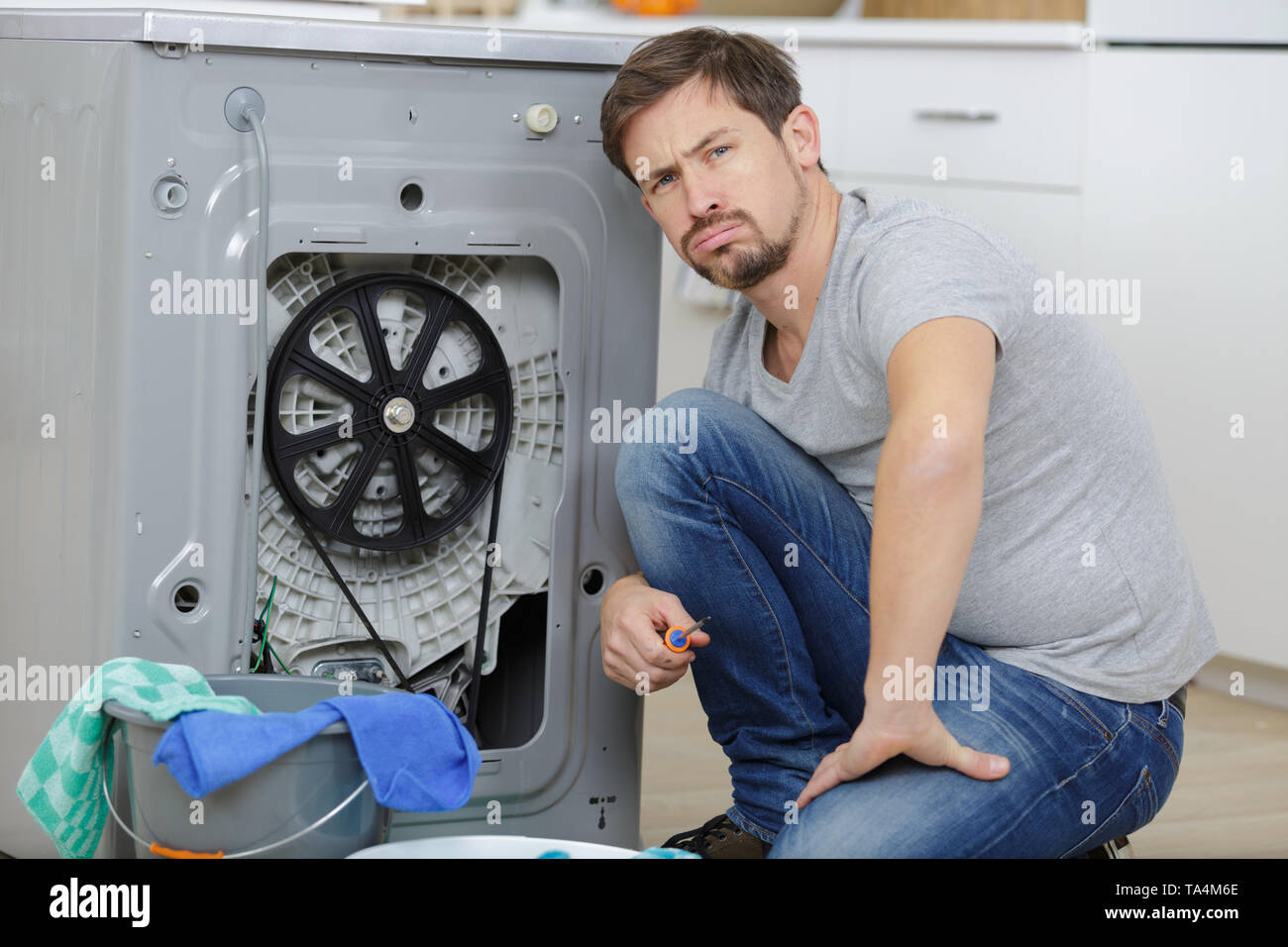 Leaking washing machine hi-res stock photography and images - Alamy