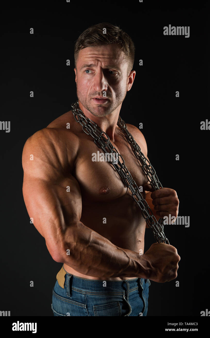 Proud of excellent shape. Man muscular athlete stand confidently. Healthy  and strong. Improve yourself. Macho handsome with muscular torso.  Attractive guy muscular chest. Muscular bodybuilder concept Stock Photo