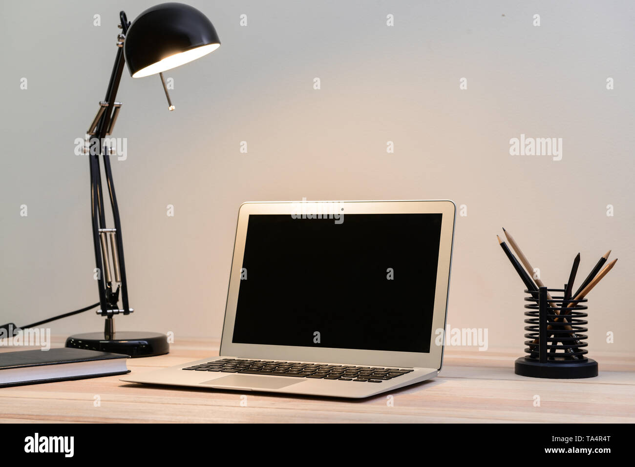 Comfortable workplace with modern laptop Stock Photo - Alamy