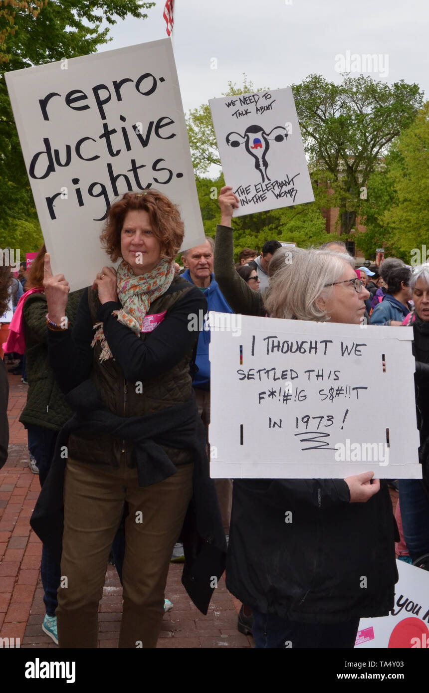 ANN ARBOR, MI/USA - MAY 21, 2019: Protesters display their sign before the Ann Arbor Stop the Bans protest organized by Planned Parenthood. Stock Photo