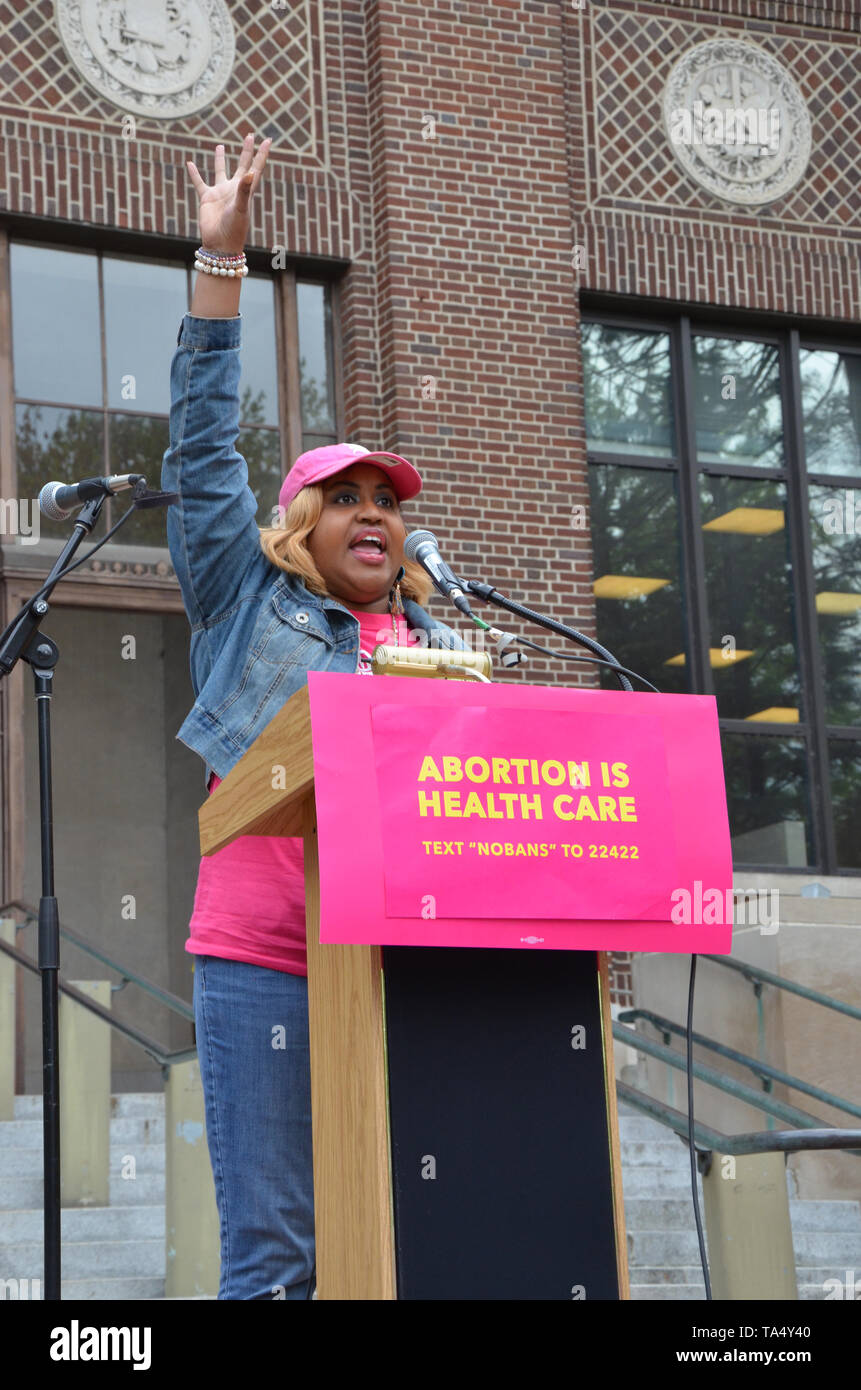 ANN ARBOR, MI/USA - MAY 21, 2019: Nicole Denson, Associate Director of Advocacy Services for the WC SAFE Program, addresses the Ann Arbor Stop the Ban Stock Photo