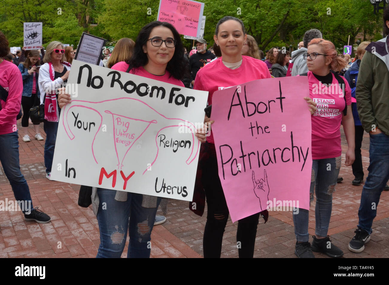ANN ARBOR, MI/USA - MAY 21, 2019: Protesters display a sign before the Ann Arbor Stop the Bans protest organized by Planned Parenthood. Stock Photo