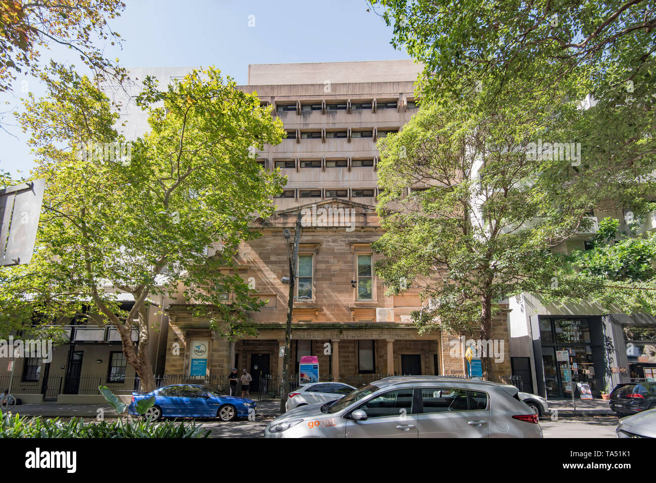 Brutalist architecture in the Sydney (Australia) suburb of Darlinghurst, this 1981 Bryce Taylor designed building sits above the 1847 Wesleyan Chapel Stock Photo