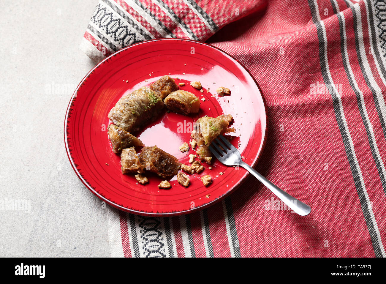 Plate with Arabian dessert in shape of half-moon as symbol of Islam ...