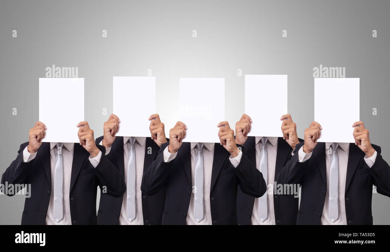 five Asian businessman cover her face with blank empty white paper for hide emotion Stock Photo