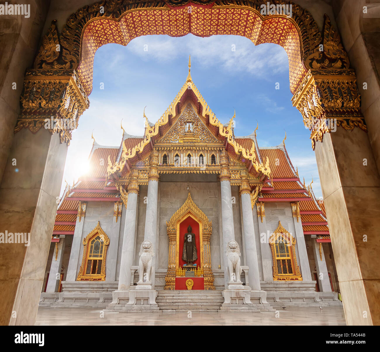 The Marble Temple or Wat Benchamabophit Dusit Wanaram in morning time with sun beam on top of church, famous landmark place for tourist sight seeing i Stock Photo