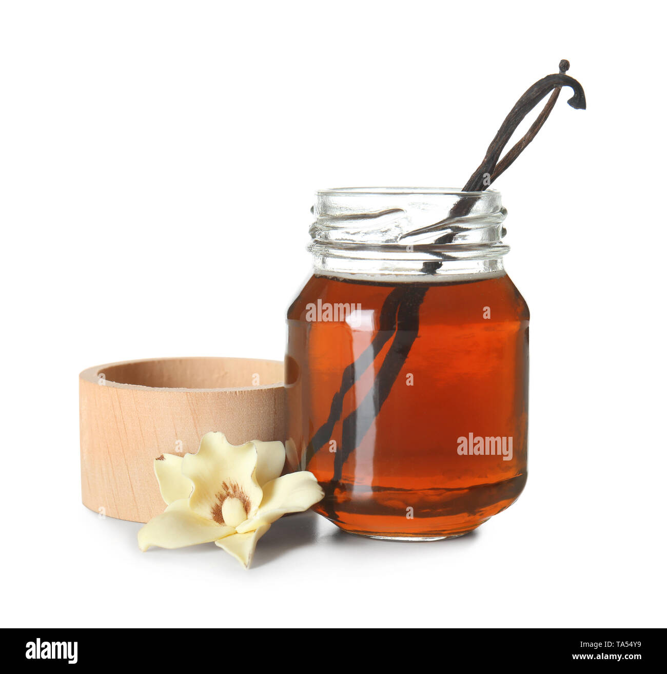 Bottle of vanilla extract on white background Stock Photo - Alamy