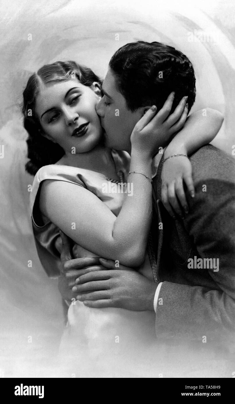Couple, Lovers, man kissing woman on cheek, around 1920, Germany Stock Photo