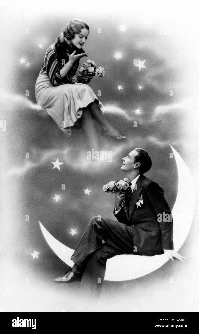 Lovers, kitsch, couple in the starry sky, man sitting on the moon, woman on a cloud, around 1920, Germany Stock Photo