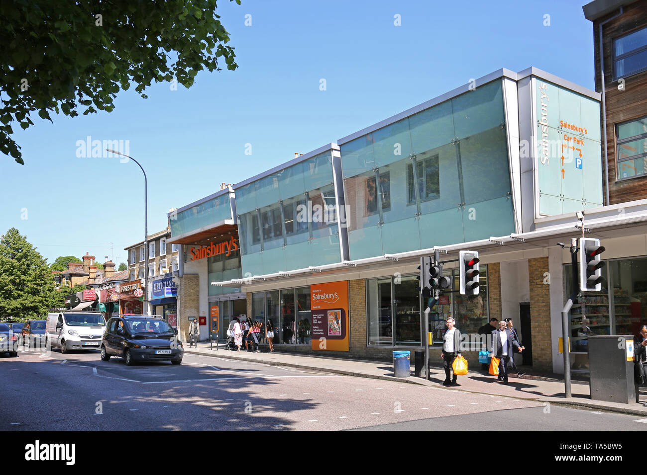 Forest Hill, south London, UK. Sainsburys supermarket on London Road, part of the South Circular Road. Shows traffic and pedestrian crossing. Stock Photo