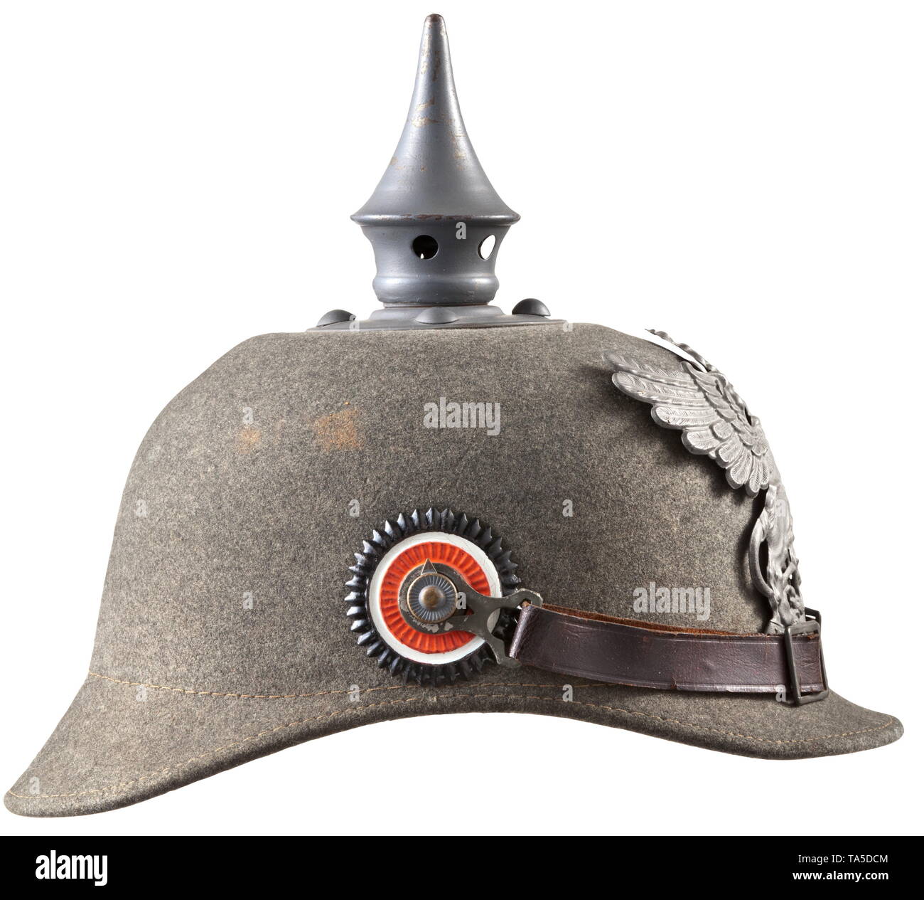 Field-grey substitute helmet for infantry troopers, circa 1916 Substitute of field-grey felt, complete with all mounts in field-grey lacquered iron, smooth spike, circular base with domed studs, original leather chinstrap on button 91, with both cockades. Leather liner with loops (slightly damaged), size 56. Signs of age. Unworn condition. historic, historical, Baden, German, Germany, Southern Germany, the South of Germany, 20th century, Additional-Rights-Clearance-Info-Not-Available Stock Photo