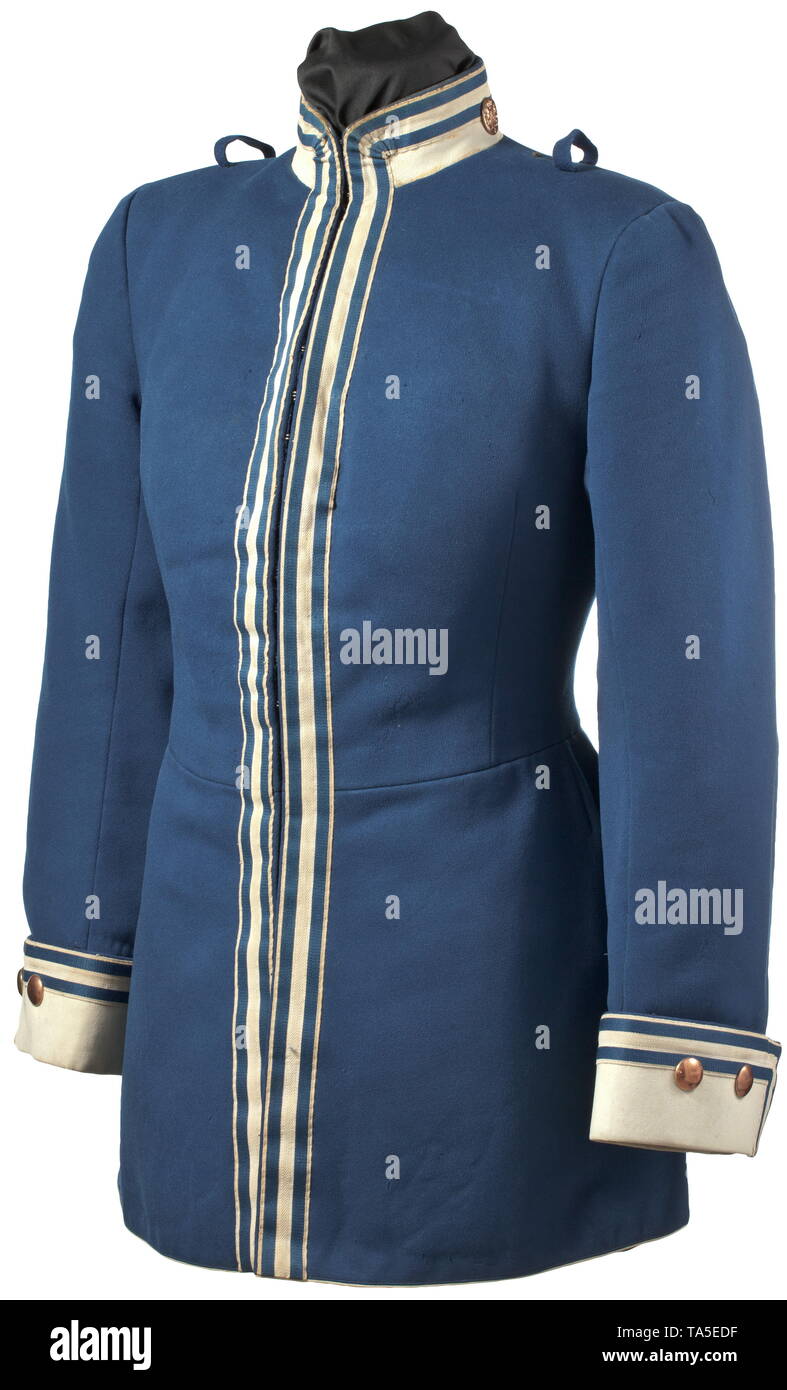 A tunic for a private of the Horse Guard Regiment Dresden, circa 1910 Elegant, privately purchased piece. Heavy tunic made of fine cornflower blue cloth, complete with blue-white border, white collar and cuffs, the collar with Saxon rank distinction buttons for a private. Complete with shoulder loops, without epaulettes. On the inside black-green silk lining with tailor's label 'Franz Schneider, Dresden', white sleeve lining. Slightly damaged in places, one coattail pocket button missing, signs of age. Worn piece in good condition. Very rare. his, Additional-Rights-Clearance-Info-Not-Available Stock Photo
