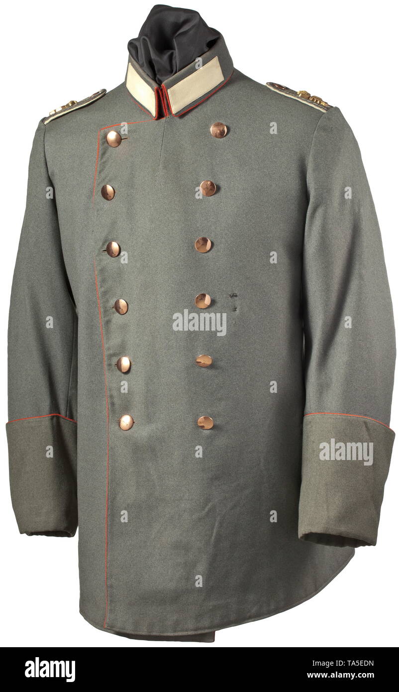 A field-grey litewka for a lieutenant of the Oldenburg Infantry Regiment No. 91, a privately purchased piece circa 1915 Field-grey cloth, collar, button border and cuffs with red trim, complete with all badges. White collar patches, sewn-on shoulder boards with heavy gilt application crown/'P'. Olive green, shiny silk lining, with fine tailor's label 'Franz Spangenmacher, Oldenburg' in the inside pocket, handwritten owner's name 'Feldw. H. Tantgen, 9.4.1915'. Signs of usage and age. Slightly worn in very good condition. Hard to find. historic, hi, Additional-Rights-Clearance-Info-Not-Available Stock Photo
