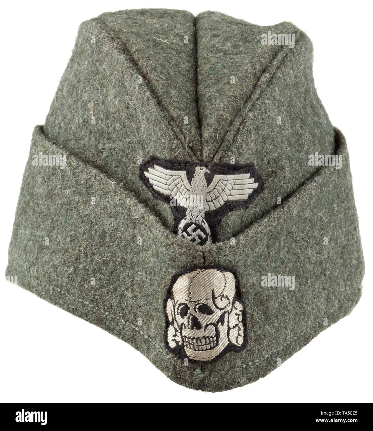 A garrison cap for enlisted men/NCOs of the Waffen-SS depot piece Field-grey woollen cloth in SS 'boat-shaped' cut with stitched-in cap piping in base cloth, thin light blue linen liner with maker's stamping from Mestska (Czechoslovakia), maker's- or RB number from 1943 and size designation 58. Machine-stitched silver-grey (colour difference) on black woven BeVo insignia. historic, historical, 20th century, 1930s, 1940s, Waffen-SS, armed division of the SS, armed service, armed services, NS, National Socialism, Nazism, Third Reich, German Reich, Germany, military, militaria, Editorial-Use-Only Stock Photo