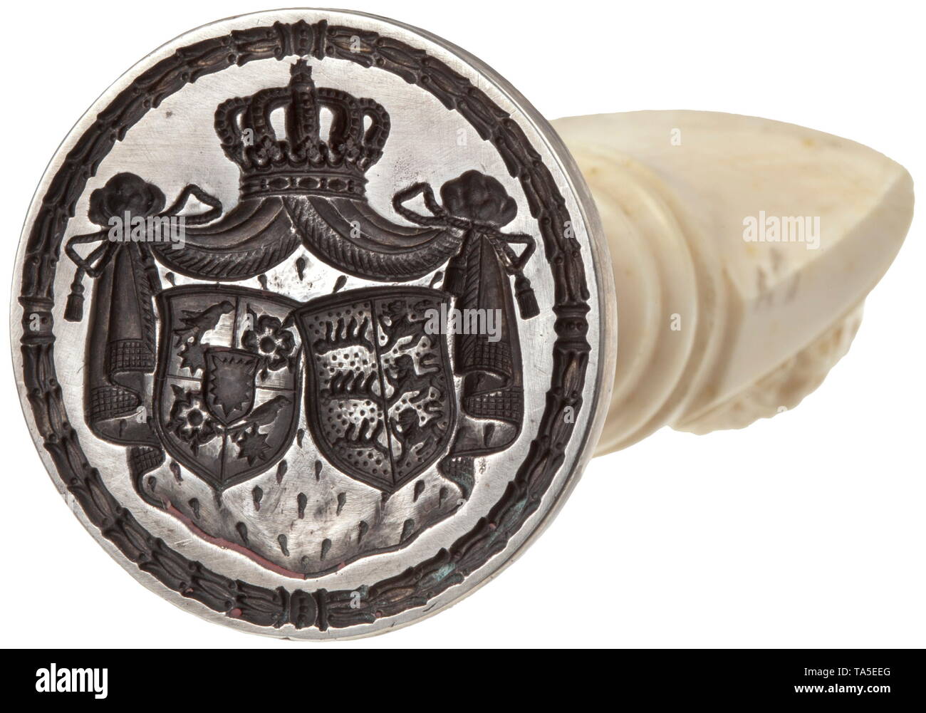 King William II of Württemberg (1848 - 1921) - a personal seal Silver seal with crowned alliance coat of arms Württemberg and Schaumburg-Lippe finely engraved on the seal matrix, the ivory handle in the shape of a young man's bust. Height 90 cm. Comes in a leather case with applied deer antler coat of arms, the bottom with gold-embossed mark of the case manufacturer 'Geo. D.Knipp Stuttgart' (purveyor to the court). Also a golden finger ring belonging to the king with crowned monogram 'W' and two contemporary postcards with portrait photographs of, Additional-Rights-Clearance-Info-Not-Available Stock Photo