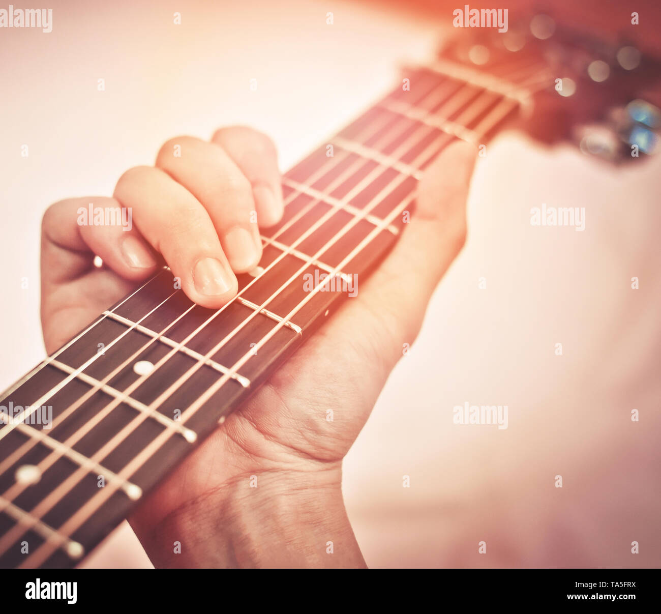 Guitar Player Hand Man Playing Acoustic Guitar In Chord Tab Guitar Fretboard Stock Photo Alamy