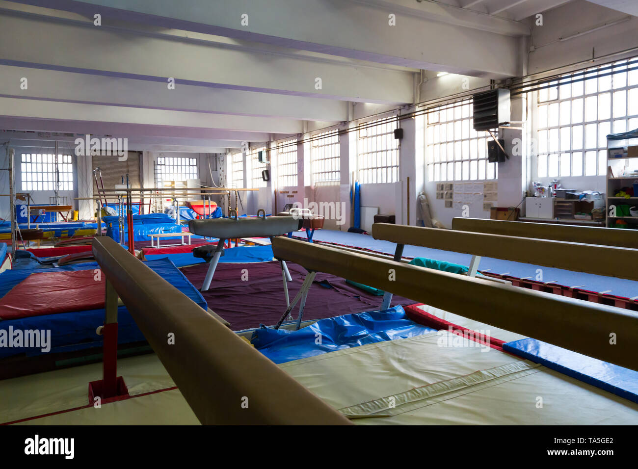 New big acrobatic with gymnastic equipment balance beams, bars and