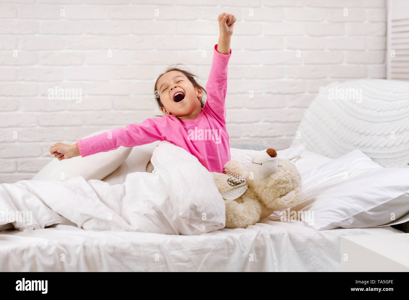 Child waking up hi-res stock photography and images - Alamy