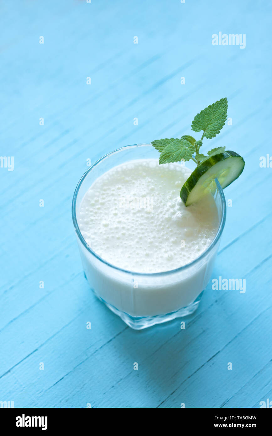 Yogurt drink (ayran, kefir, lassi) in glass healthy summer refreshing