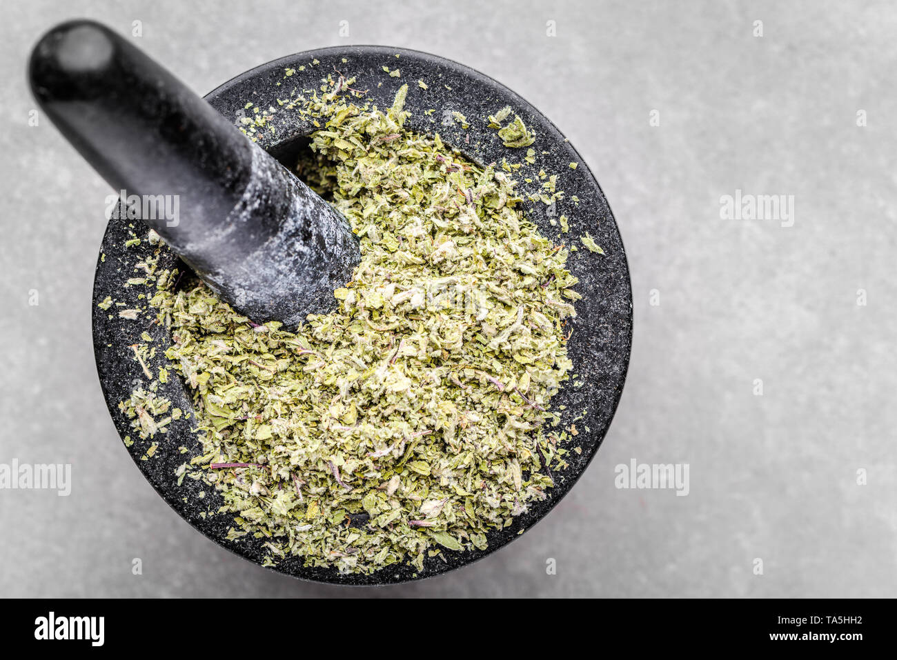 Herbal Tea Or Dry Herb In Mortar Top View Of Aromatic Spice Dried Oregano Basil Marjoram Or Parsley Crushed Leaves In Mortar Stock Photo Alamy