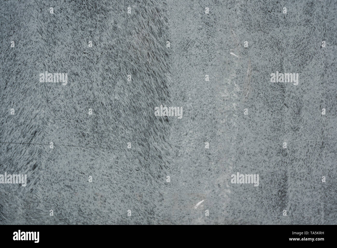 Strokes paint on a window pane Stock Photo