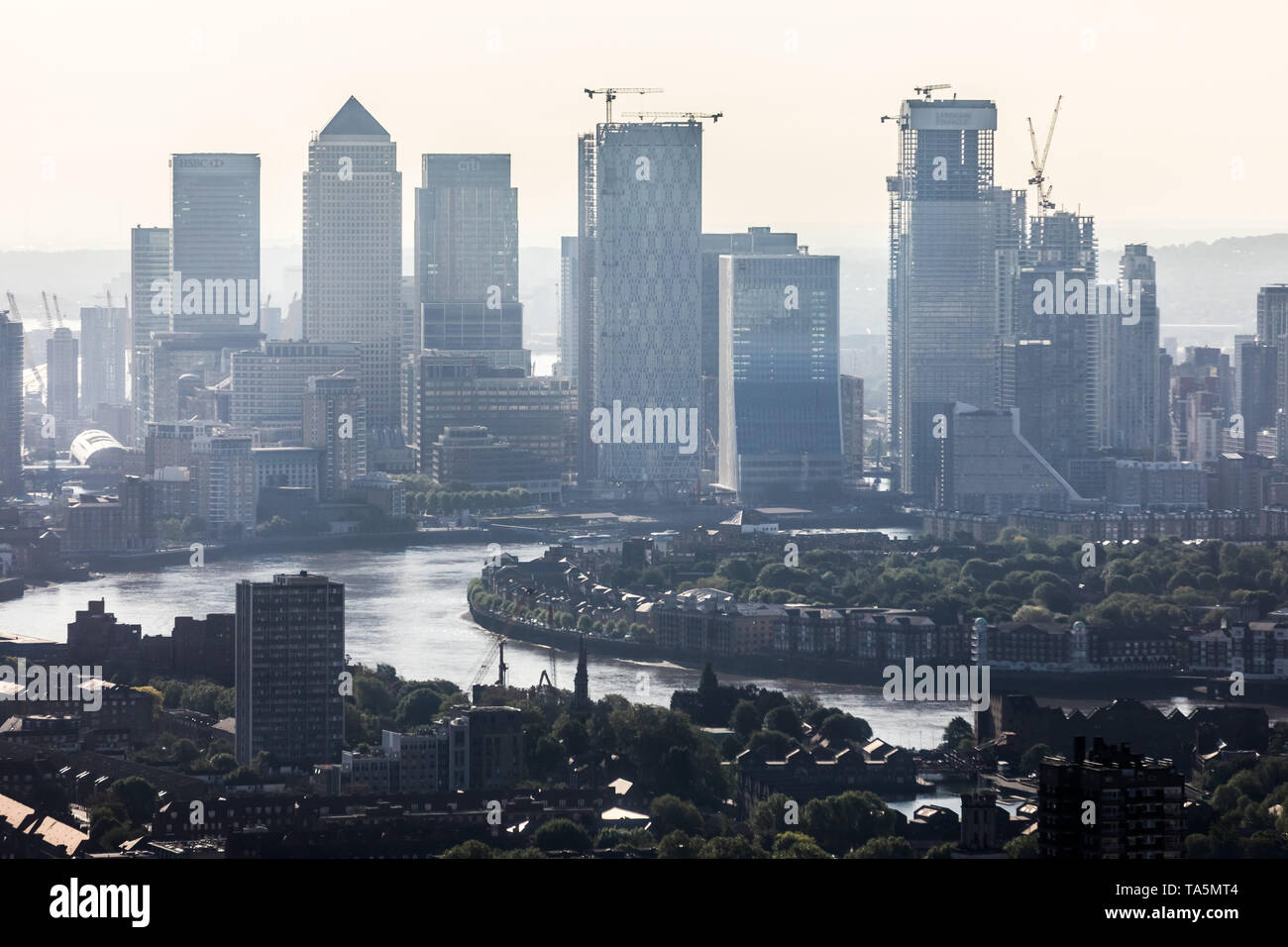 UK Weather: Morning light over Canary Wharf business park buildings in east London. Stock Photo