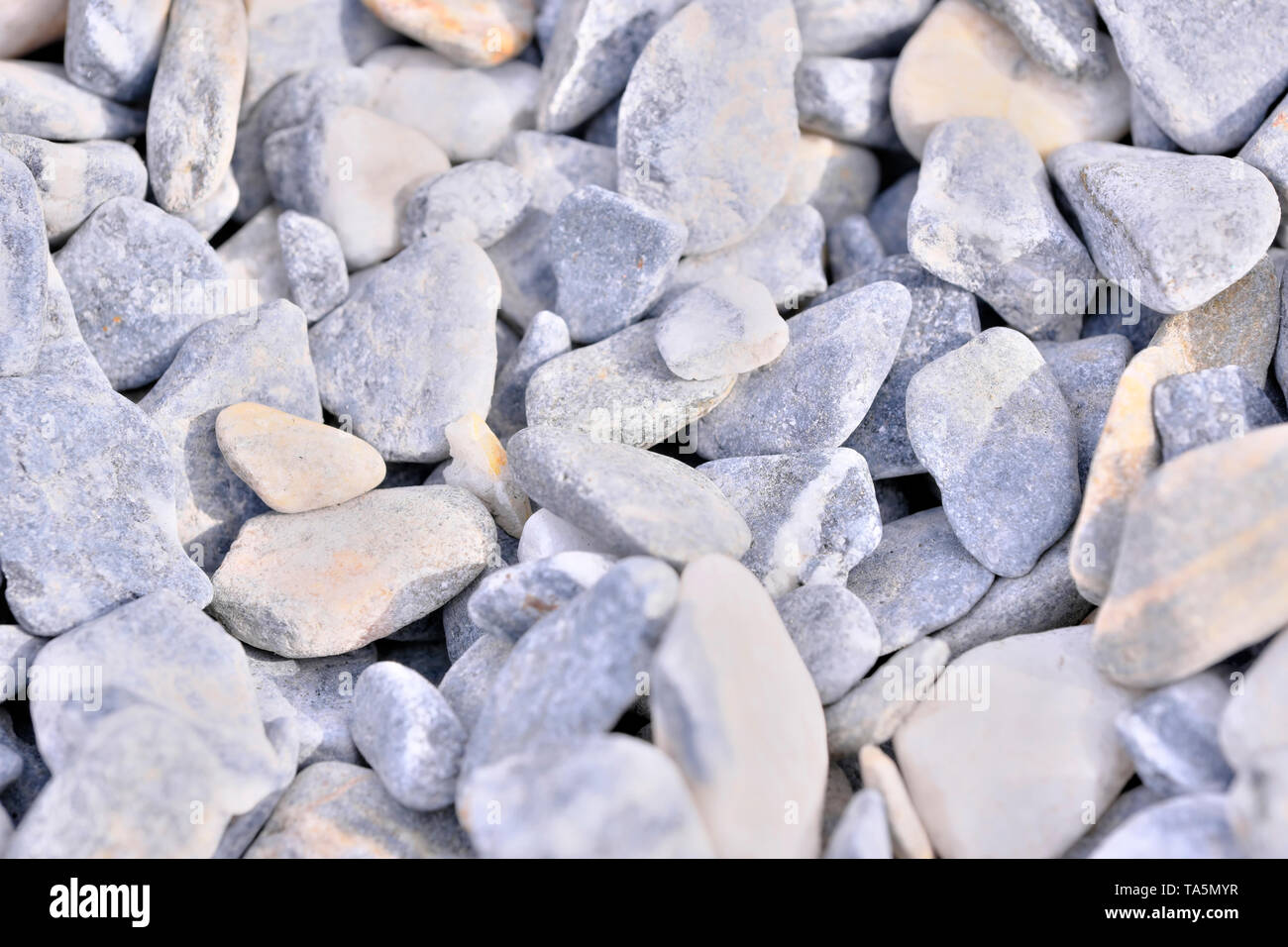 Decorative stone building pebbles close-up macro photo stone designer background Stock Photo