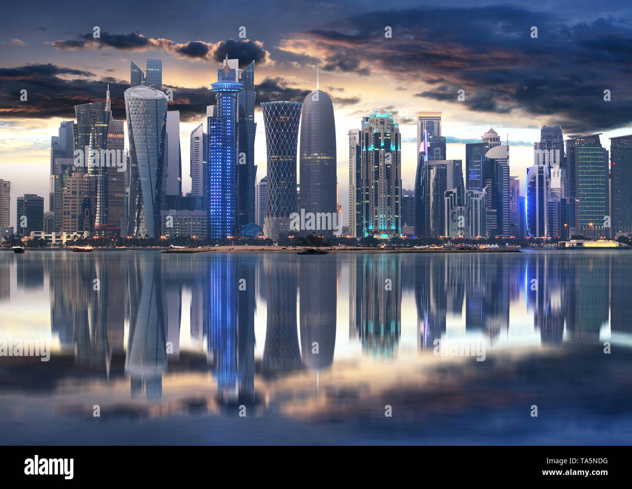 Doha city skyline city center at night, Qatar Stock Photo