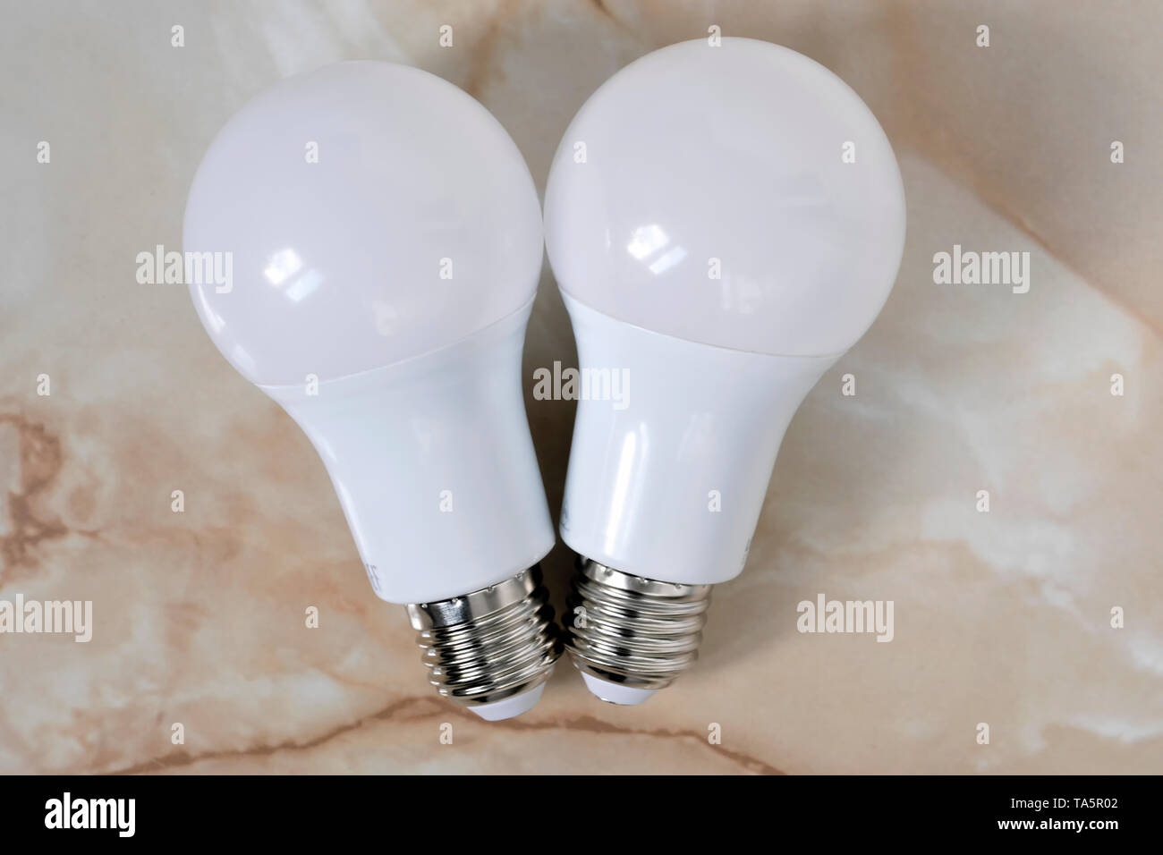 Lighting electric lamps for living rooms LED close-up lie on the table Stock Photo