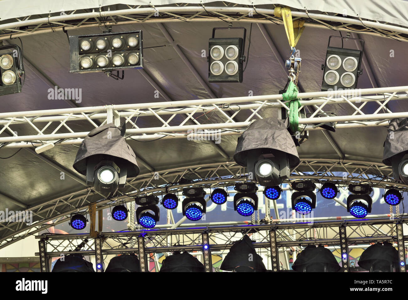 Outdoor stage lighting equipment with a tarpaulin rain cover Stock Photo -  Alamy