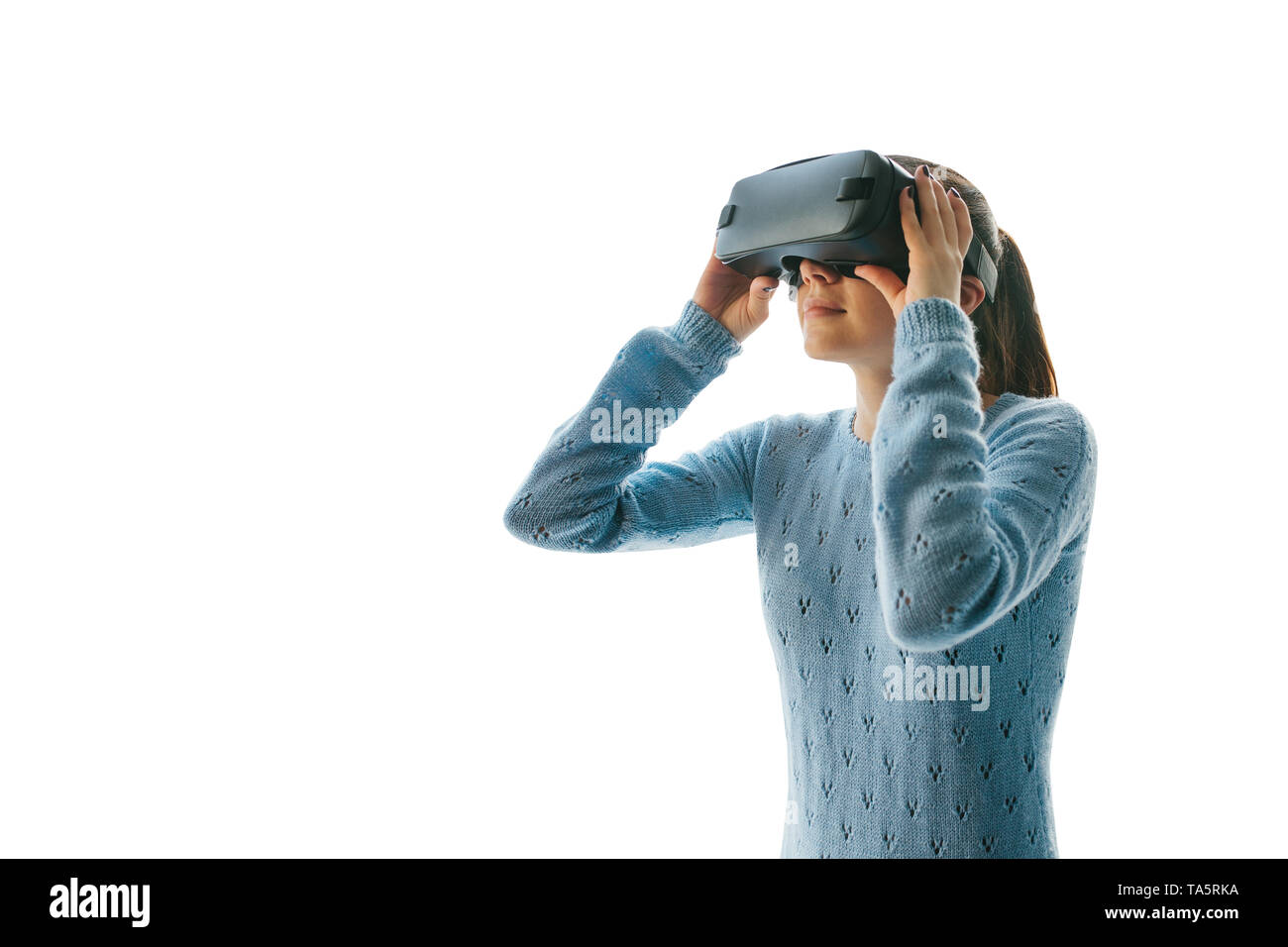 The woman with glasses of virtual reality on a white background. Future