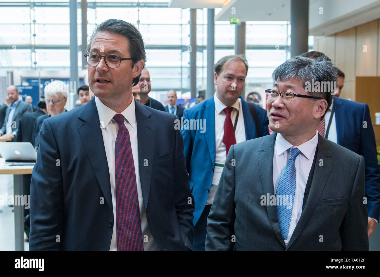Leipzig, Germany. 22nd May, 2019. Andreas Scheuer (CSU, l), Federal Minister of Transport, and Young Tae Kim, Secretary General of the International Transport Forum (ITF), meet at the beginning of the International Transport Forum in Leipzig. Around 1300 scientists and politicians from 70 countries will discuss the mobility of the future at the International Transport Forum. This year, the three-day conference will focus on concepts that bring city and country closer together. Credit: Hendrik Schmidt/dpa-Zentralbild/dpa/Alamy Live News Stock Photo