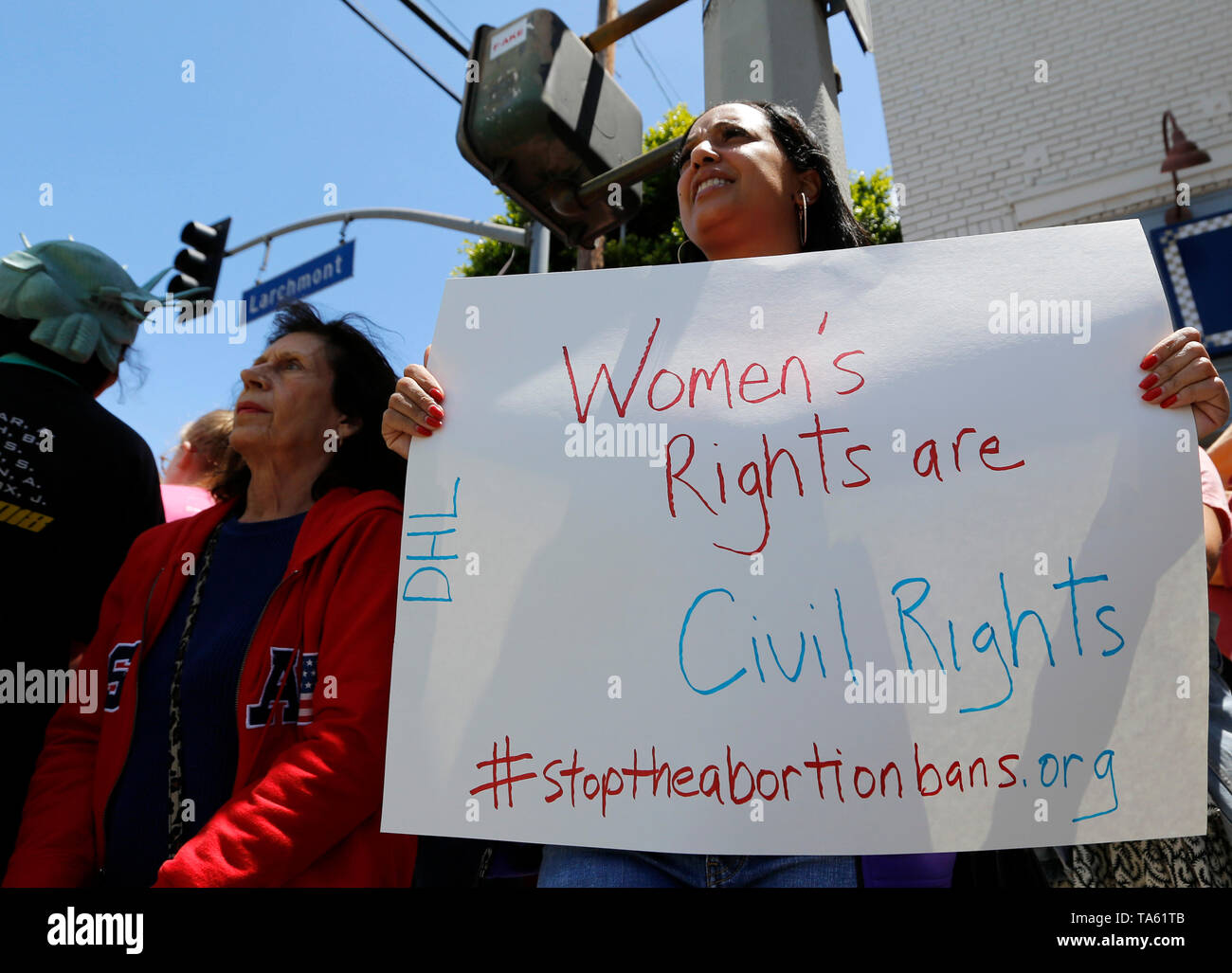 Los Angeles, USA. 21st May, 2019. People attend a rally in Los Angeles, the United States, on May 21, 2019. Dozens of rallies were held Tuesday in southern California's major cities to denounce the growing number of states passing restrictive abortion laws and demand women's rights in the contentious abortion issue. Credit: Li Ying/Xinhua/Alamy Live News Stock Photo