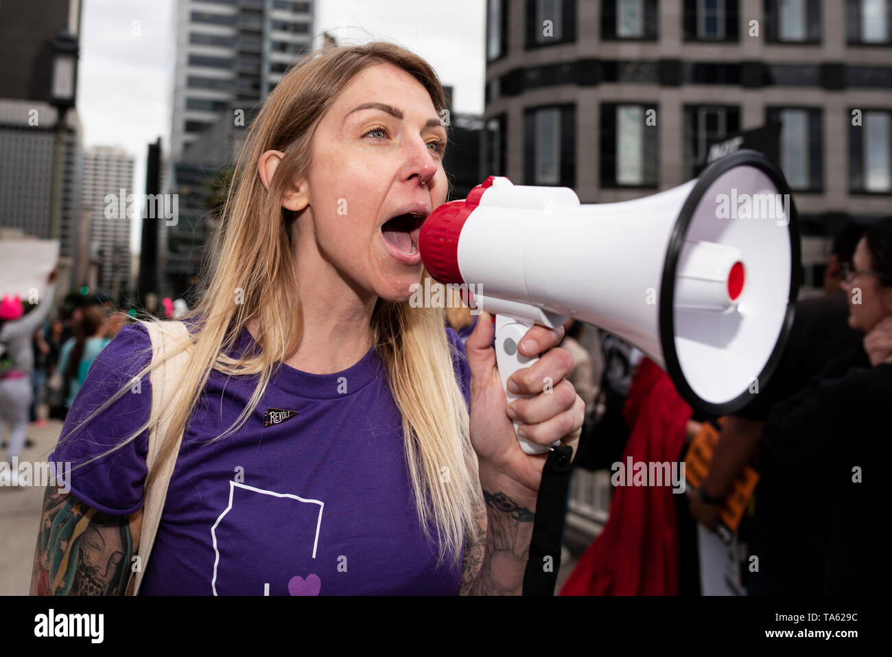 An activist seen chanting slogans on a megaphone during the protest. Women rights activists protested against restrictions on abortions after Alabama passed the most restrictive abortion bans in the US. Similar Stop the Bans Day of Action for Abortion Rights rallies were held across the nation. Stock Photo
