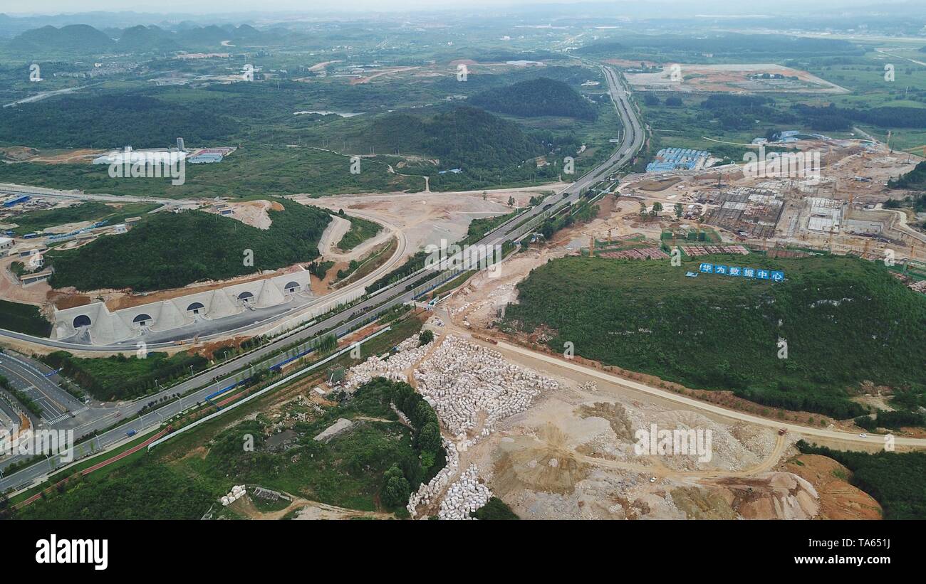 (190522) -- GUIZHOU, May 22, 2019 (Xinhua) -- Aerial photo taken on May 19, 2019 shows the Tencent Guian Qixing Center (L) and the construction site of a Huawei Cloud data center in Gui'an New Area of southwest China's Guizhou Province. In Guizhou Province, which hosts China's first state-level big data pilot zone, the integration of big data with sectors such as real economy, social management, civil service and rural revitalization has brought significant changes to people's life. According to statistics, Guizhou has more than 9,500 big data enterprises and many of them are active players on Stock Photo