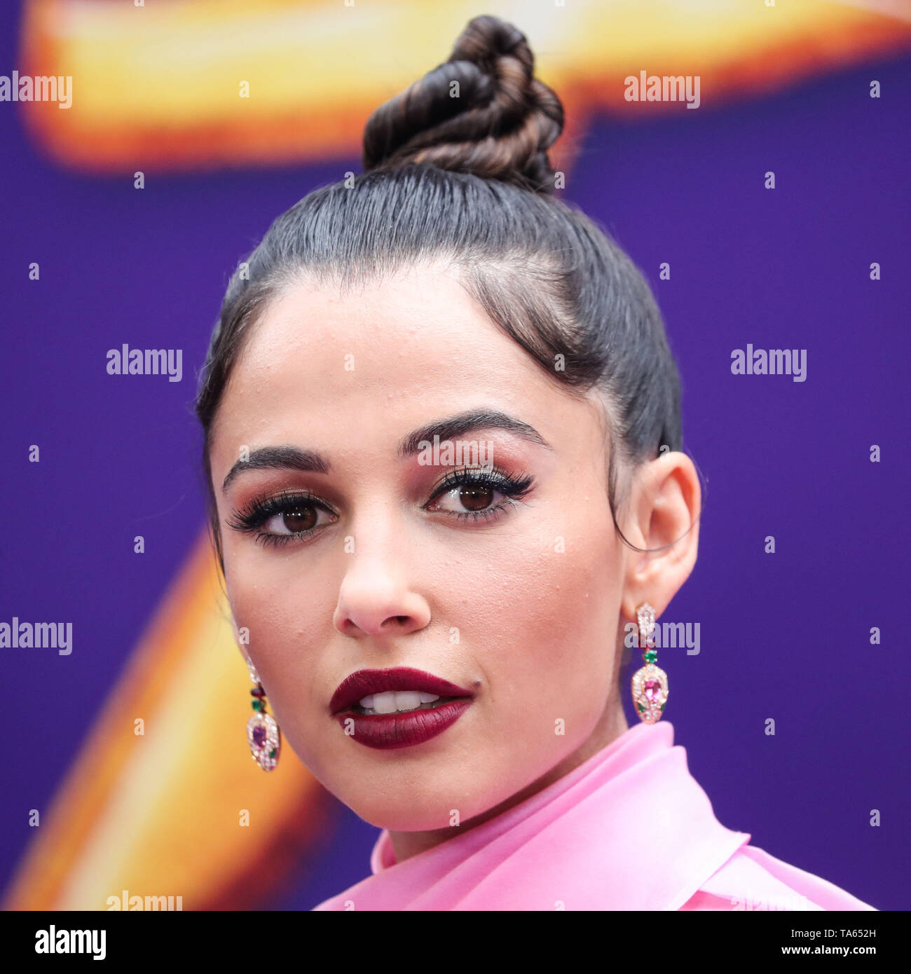 Hollywood, United States. 21st May, 2019. HOLLYWOOD, LOS ANGELES, CALIFORNIA, USA - MAY 21: Actress Naomi Scott wearing a Brandon Maxwell gown arrives at the World Premiere Of Disney's 'Aladdin' held at the El Capitan Theatre on May 21, 2019 in Hollywood, Los Angeles, California, United States. (Photo by Xavier Collin/Image Press Agency) Credit: Image Press Agency/Alamy Live News Stock Photo