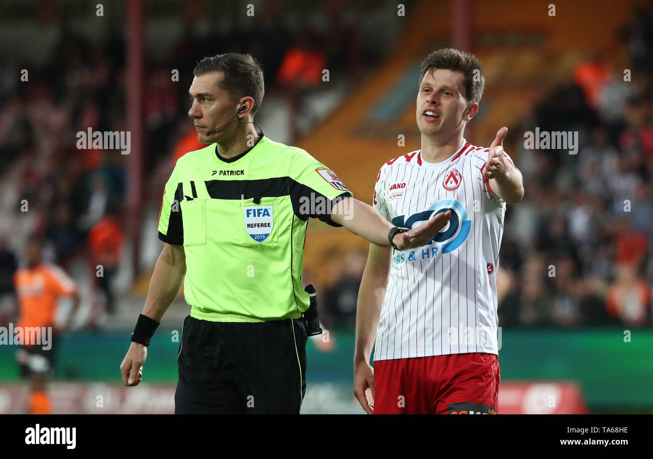 KORTRIJK, BELGIUM - MAY 22: Referee Jonathan Lardot and Hannes Van Der Bruggen of Kv Kortrijk during the Jupiler Pro League play-off 2 final between Kv Kortrijk and Sporting Charleroi on May 22, 2019 in Kortrijk, Belgium. (Photo by Vincent Van Doornick/Is Stock Photo