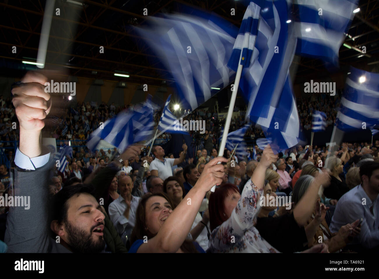 Athens, Greece. 22nd May 2019. Conservative New Democracy party supporters wave flags and shout slogans. New Democracy fans attended the party’s main pre-election rally in Athens as Greeks will vote for European Parliament and municipalities on May 26th.© Nikolas Georgiou / Alamy Live News Stock Photo