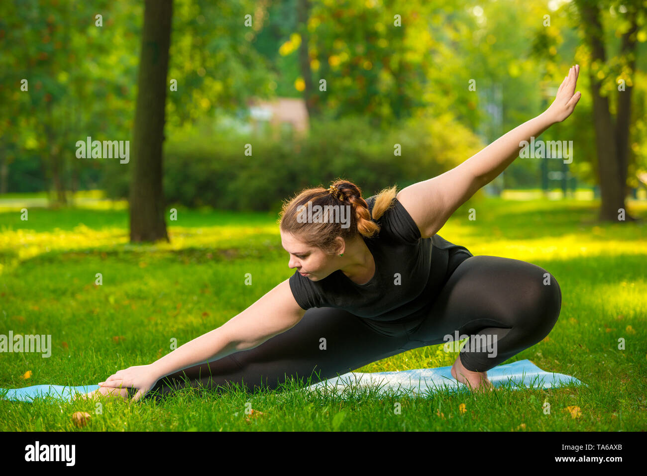 Stretch Routine For Plus Size Plus size model in stretching hi-res stock photography and images - Alamy
