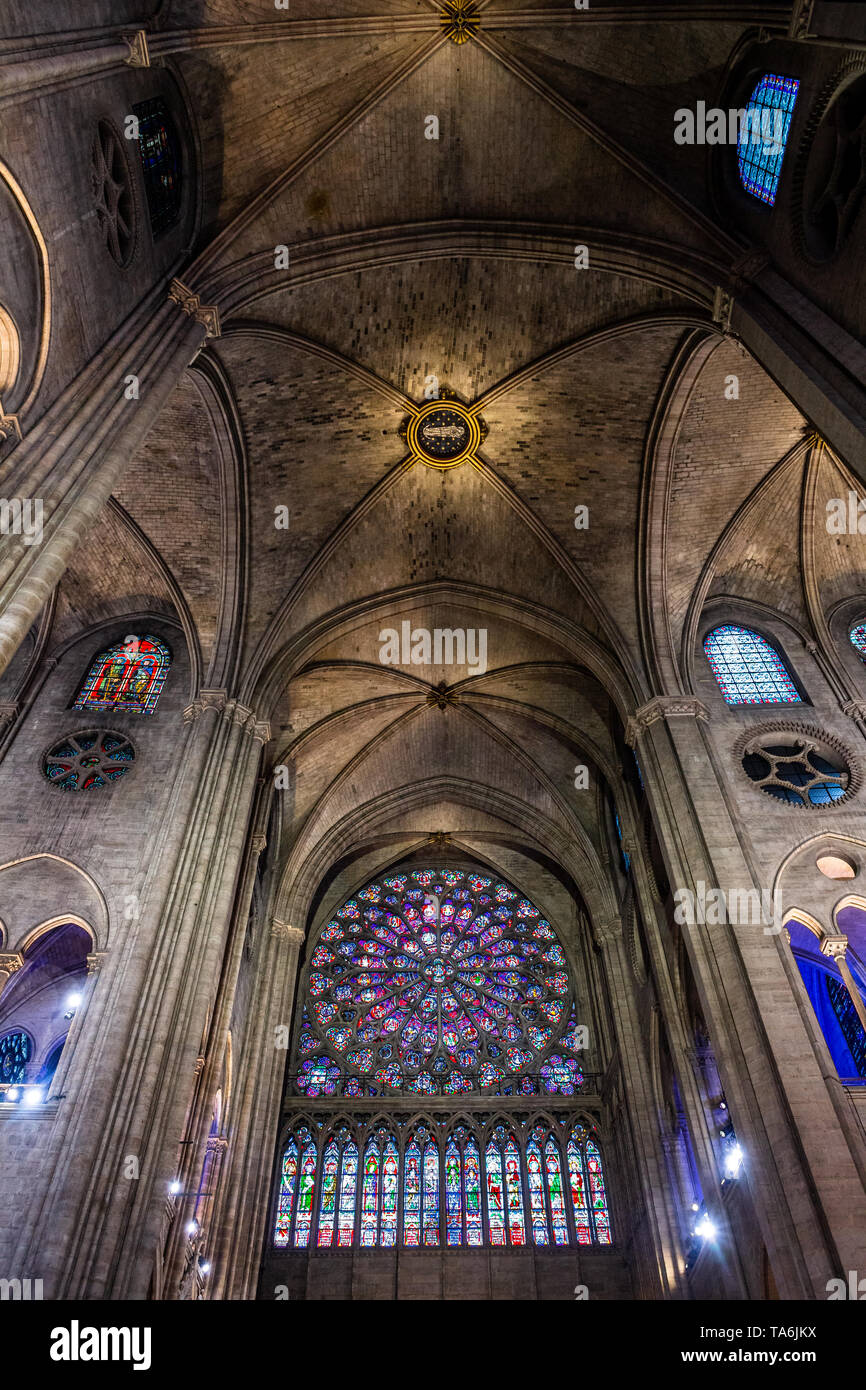 A View Of One Of The Famous Rose Windows Inside Notre Dame