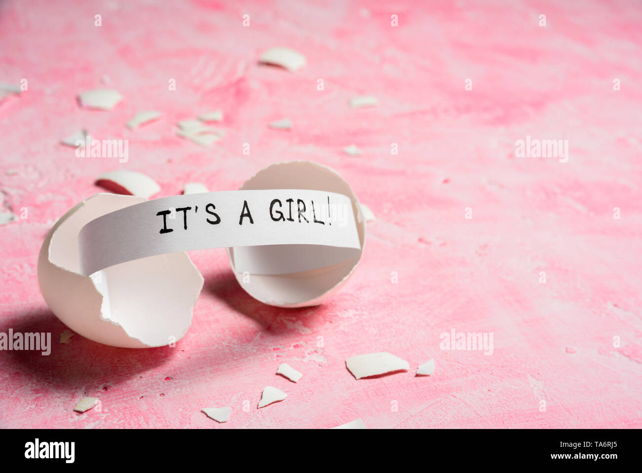 Baby Shower Concept Girl Pink Cracked Egg With A Message It S A